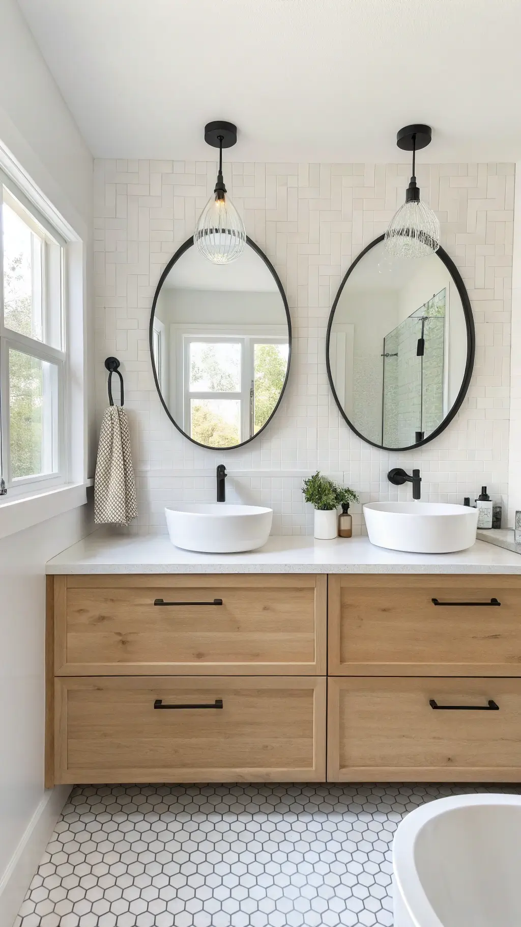 Scandinavian minimalist bathroom with pale oak double vanity, white penny tile backsplash, black matte accessories, and a single black pendant light in evenly bright, clean atmosphere.